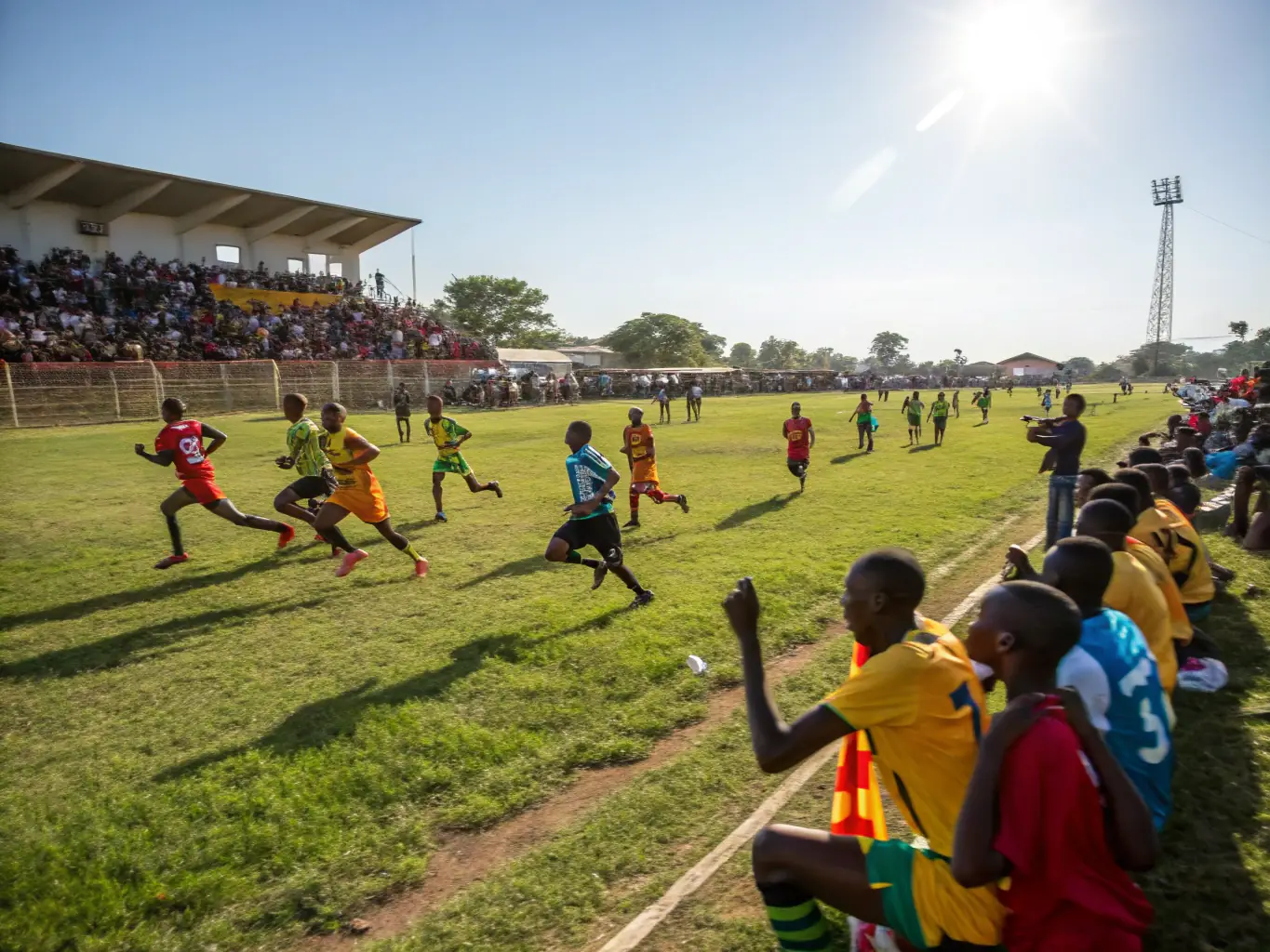 A vibrant image of the annual football competition organized by UNION SPORTIVE LONZACOISE 96, featuring teams from different regions competing for the championship trophy.